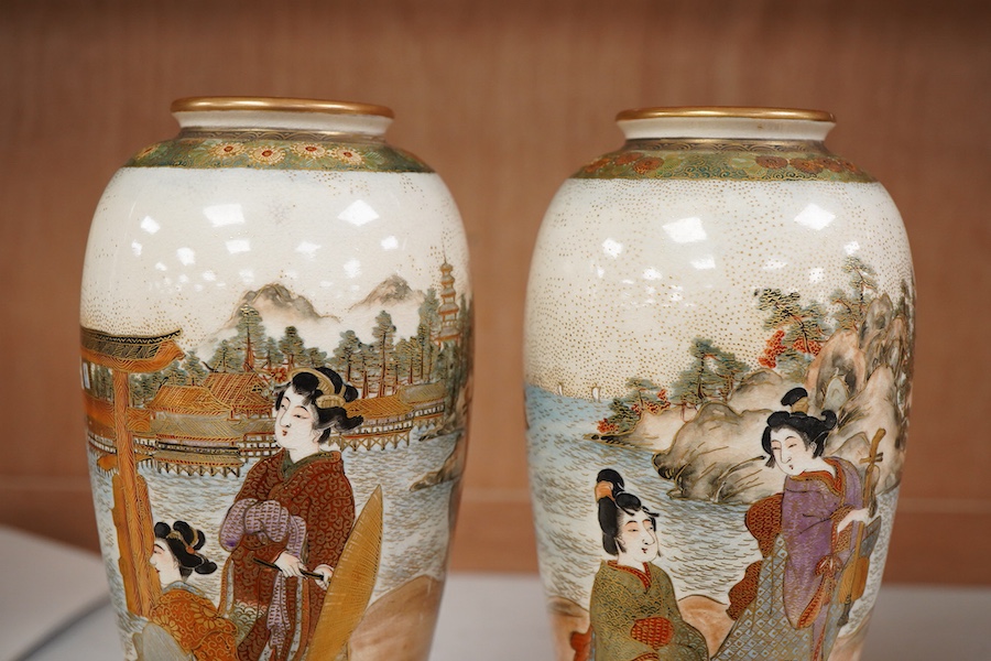 A pair of Japanese satsuma vases and stands, signed, Meiji period (1868-1912), 21cm total